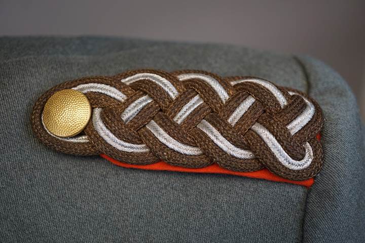 A close up of a braided fabric

Description automatically generated