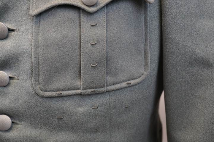 Close-up of a grey jacket

Description automatically generated