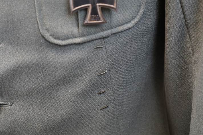 A close-up of a military uniform

Description automatically generated