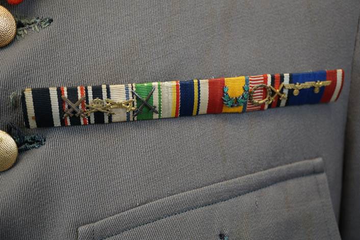 A close-up of a military ribbon

Description automatically generated