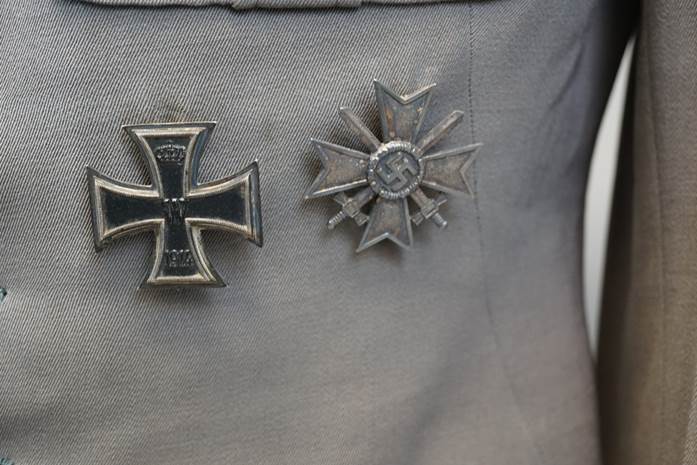 A close-up of a military uniform

Description automatically generated