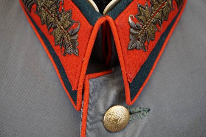 A close-up of a military uniform

Description automatically generated