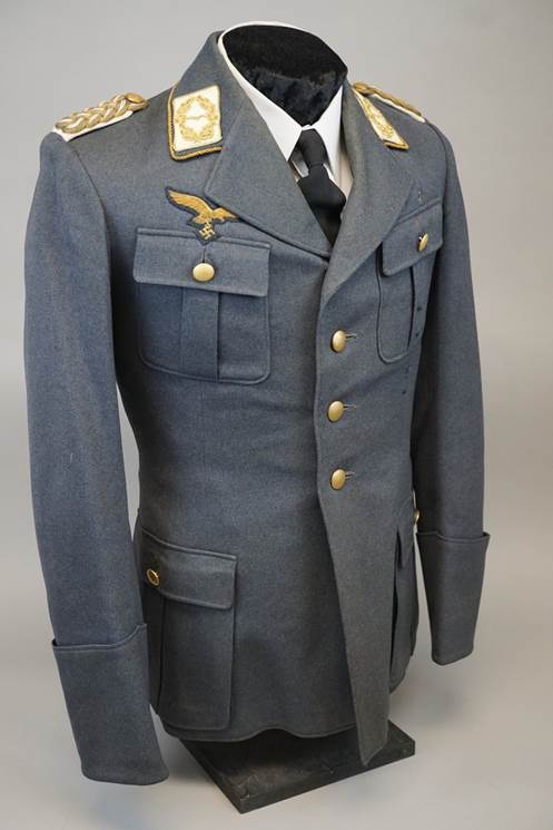 A uniform on a mannequin

Description automatically generated