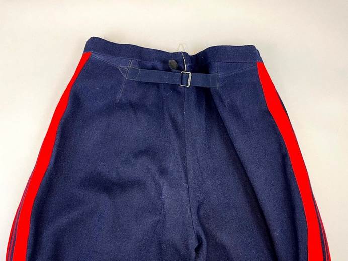 A blue and red pants

Description automatically generated