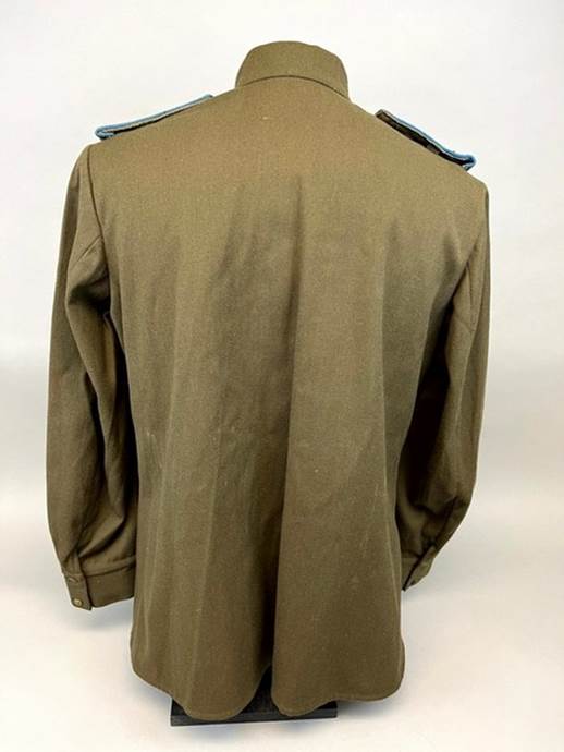 A back view of a military jacket

Description automatically generated