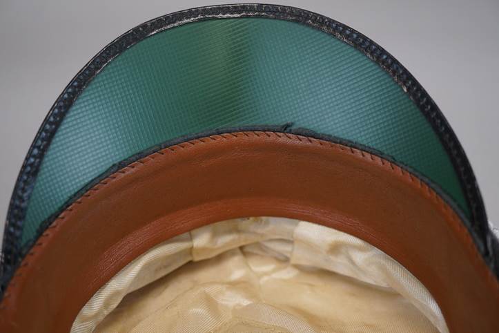 A close-up of a hat

Description automatically generated