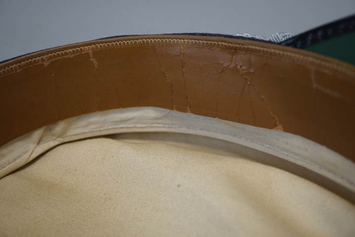 A close-up of a leather belt

Description automatically generated