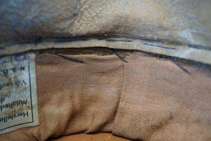 A close-up of a brown fabric

Description automatically generated