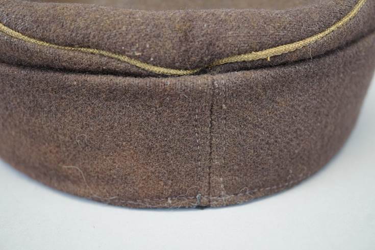 A close-up of a hat

Description automatically generated