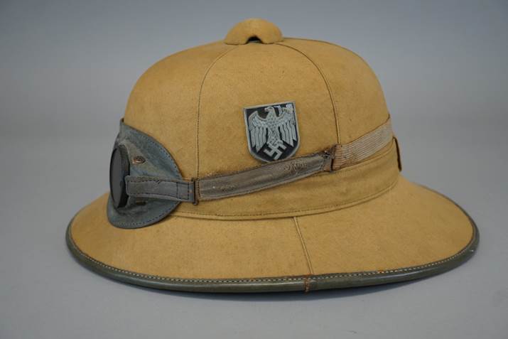 A hat with a patch on it

Description automatically generated