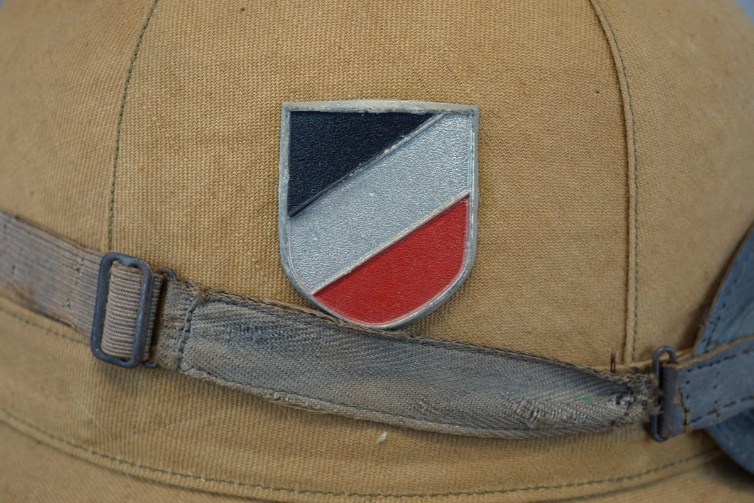 A close-up of a hat

Description automatically generated