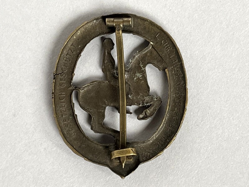 A close-up of a badge

AI-generated content may be incorrect.