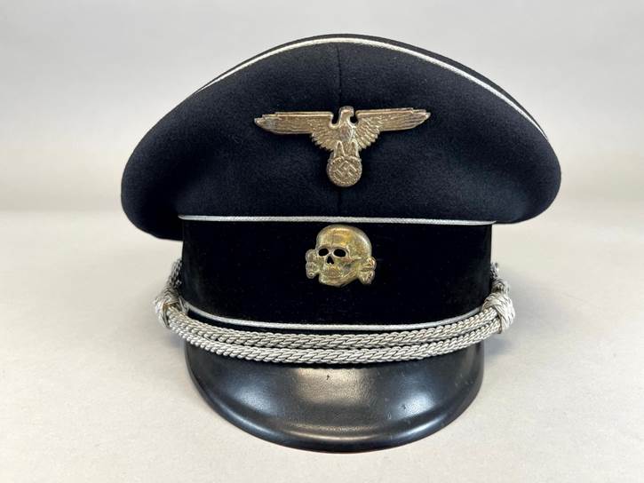 A black hat with a skull and a white rope

AI-generated content may be incorrect.
