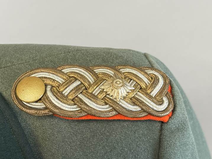 A close up of a uniform

AI-generated content may be incorrect.