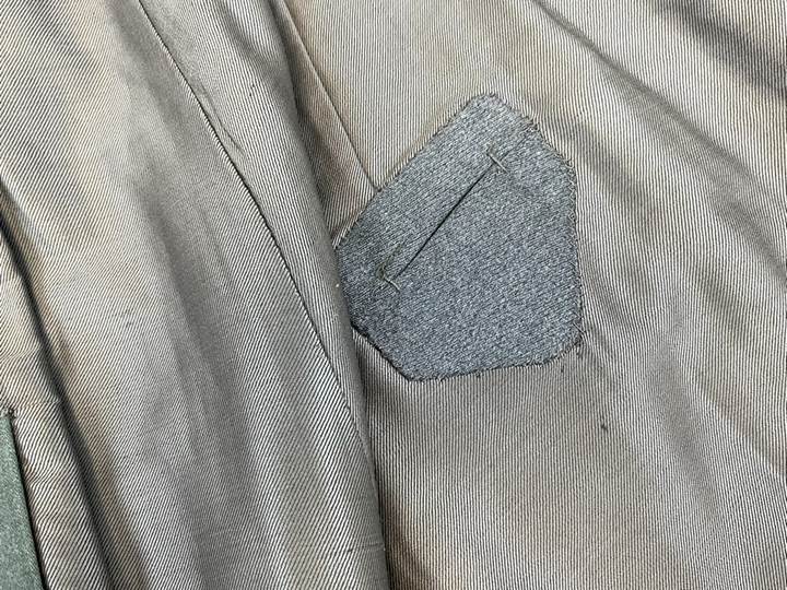 A patch on a piece of clothing

AI-generated content may be incorrect.
