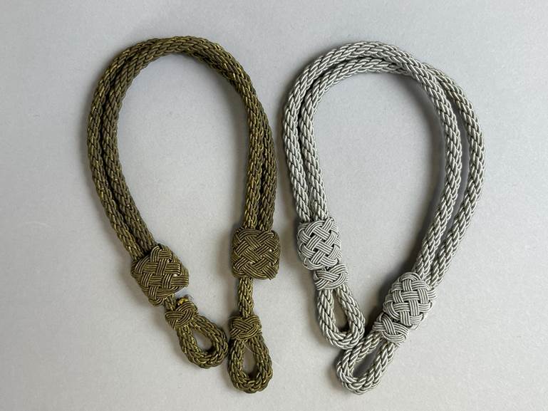 A pair of braided ropes

AI-generated content may be incorrect.