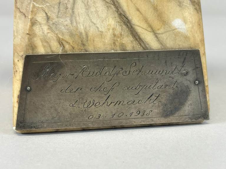 A plaque with engraved text

AI-generated content may be incorrect.