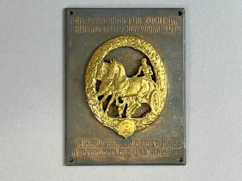 A plaque with a horse and carriage

AI-generated content may be incorrect.