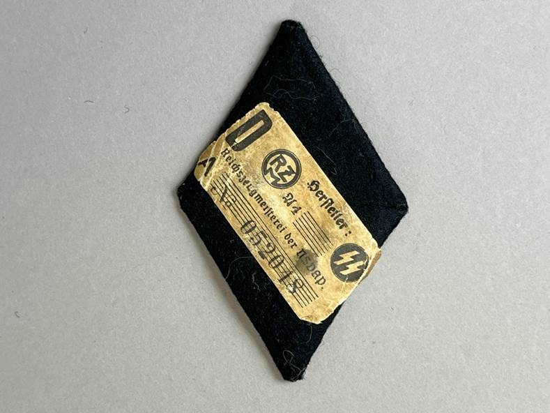 A black diamond with a gold label

AI-generated content may be incorrect.