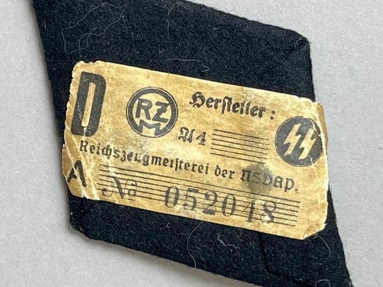 A piece of cloth with a label

AI-generated content may be incorrect.