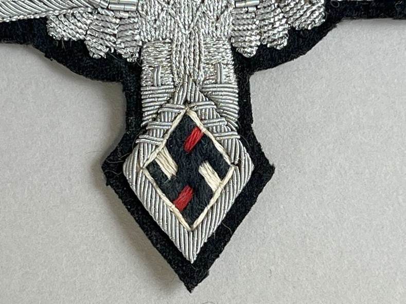 A close-up of a patch

AI-generated content may be incorrect.