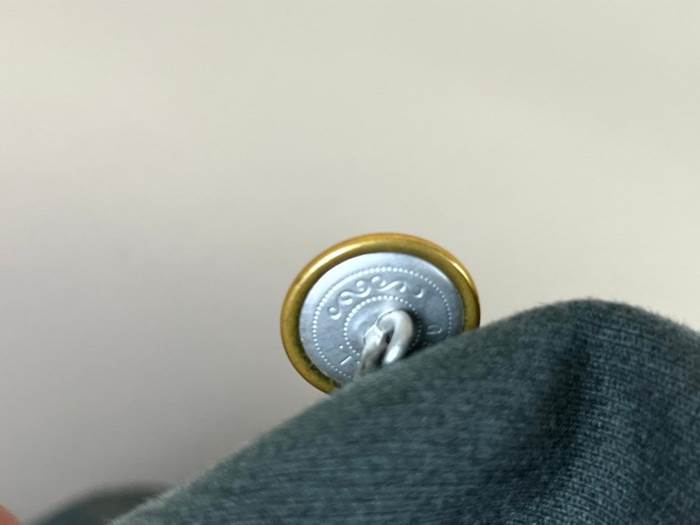 A close-up of a button

AI-generated content may be incorrect.