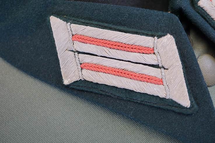 Close-up of a patch on a military uniform

AI-generated content may be incorrect.