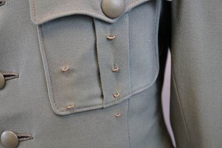 Close-up of a military uniform

AI-generated content may be incorrect.