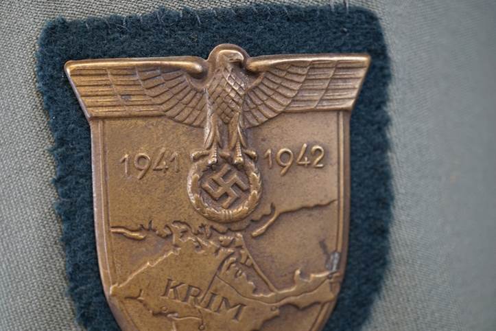 A close-up of a badge

AI-generated content may be incorrect.