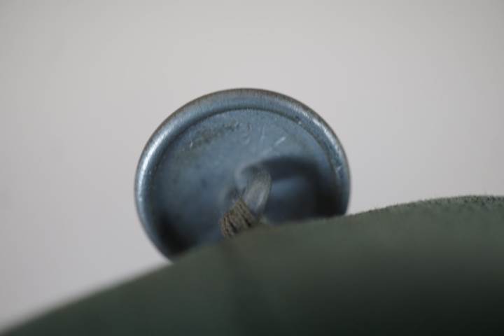Close-up of a thumbtack

AI-generated content may be incorrect.