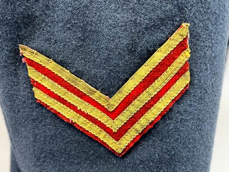 A red and yellow chevron on a gray fabric

AI-generated content may be incorrect.