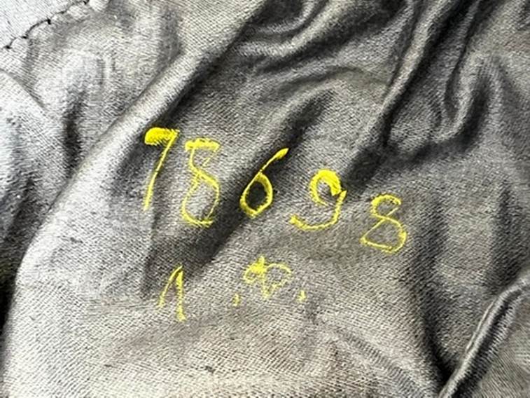 A close-up of a fabric with numbers

AI-generated content may be incorrect.