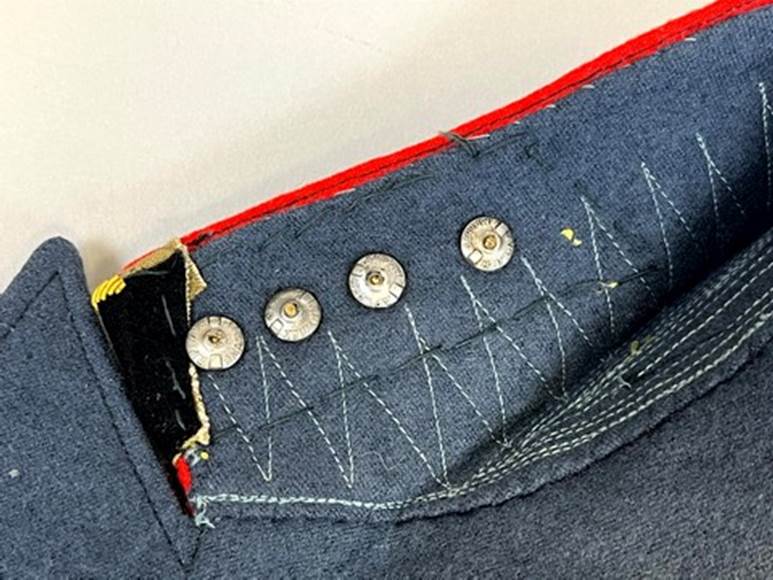 A close up of a blue jacket

AI-generated content may be incorrect.