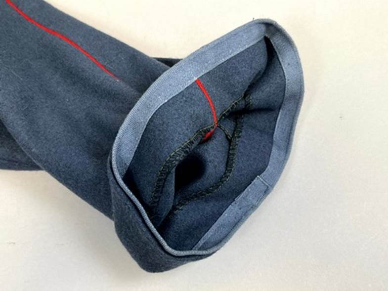 A rolled up blue fabric

AI-generated content may be incorrect.