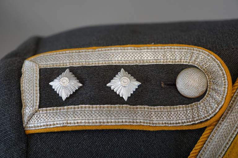 A close up of a uniform

AI-generated content may be incorrect.