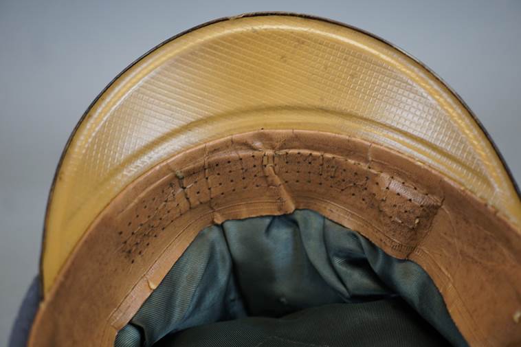 A close-up of a hat

AI-generated content may be incorrect.
