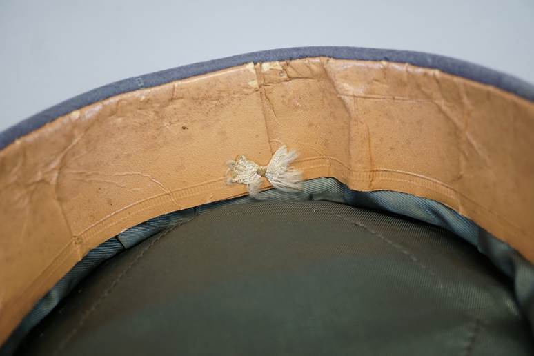 A close-up of a hat

AI-generated content may be incorrect.