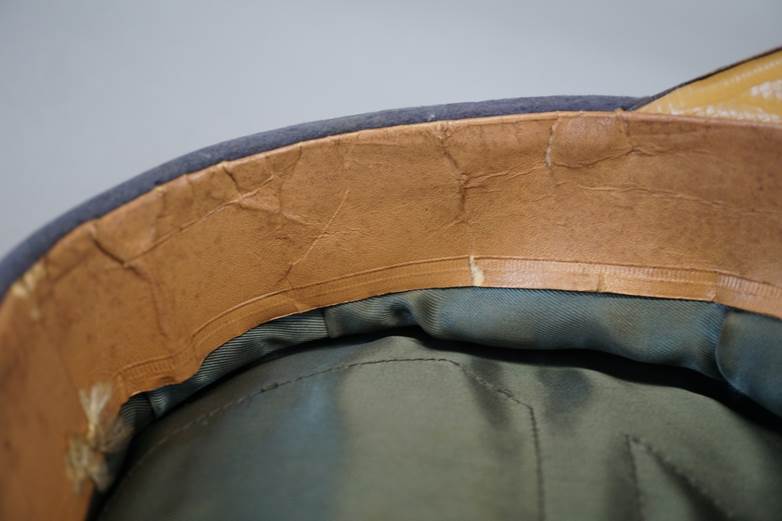 A close-up of a hat

AI-generated content may be incorrect.