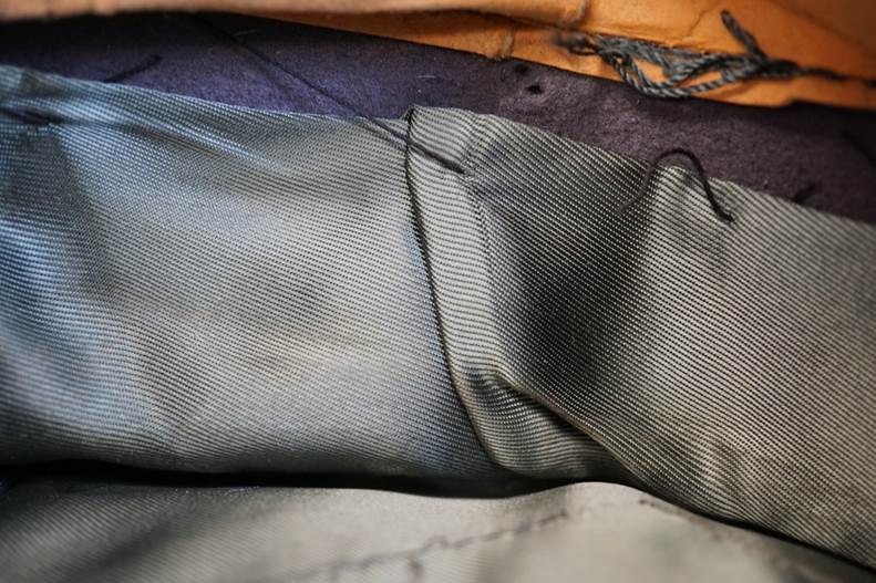 A close-up of a fabric

AI-generated content may be incorrect.