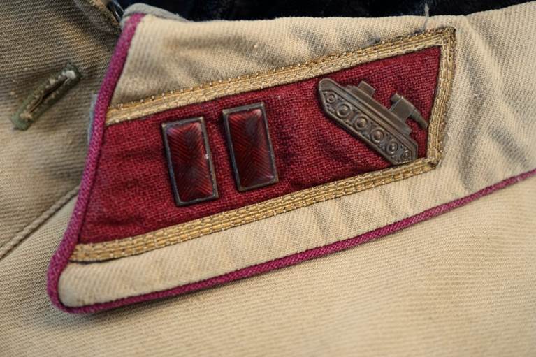 Close-up of a military uniform

AI-generated content may be incorrect.