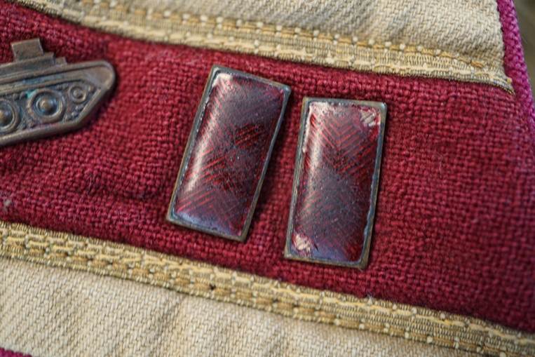 A close-up of a red fabric

AI-generated content may be incorrect.