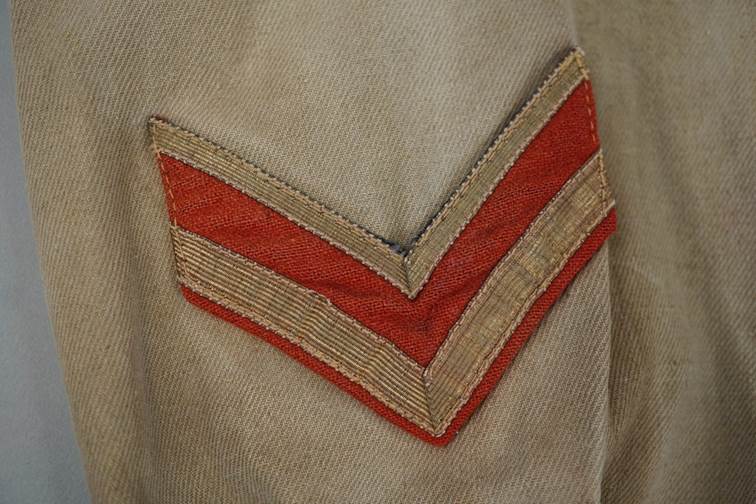 A close-up of a red and gold chevron

AI-generated content may be incorrect.