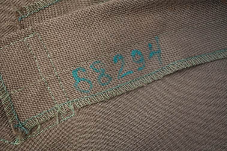 A piece of fabric with numbers

AI-generated content may be incorrect.