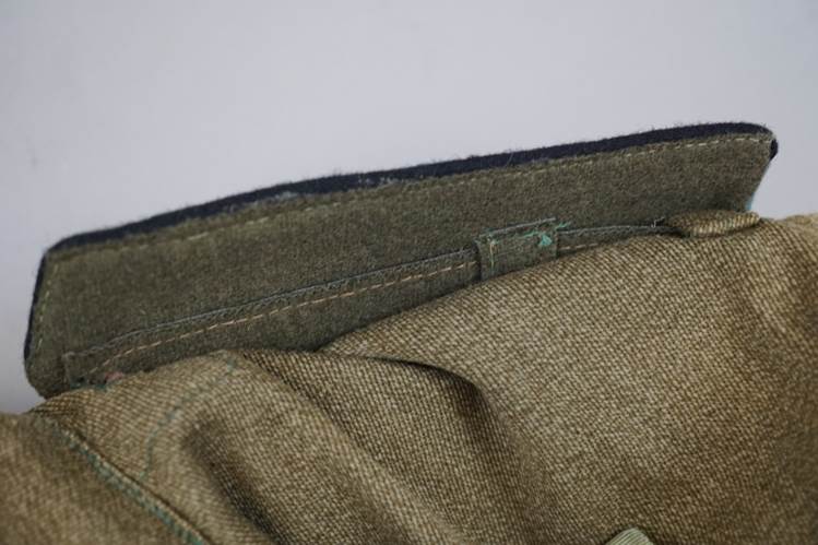 Close-up of a green fabric

AI-generated content may be incorrect.