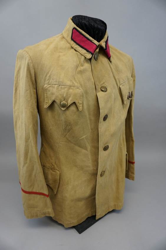 A brown jacket with red trim

AI-generated content may be incorrect.