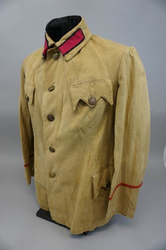 A brown jacket with red trim

AI-generated content may be incorrect.