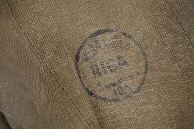 A close-up of a stamp on a cloth

AI-generated content may be incorrect.