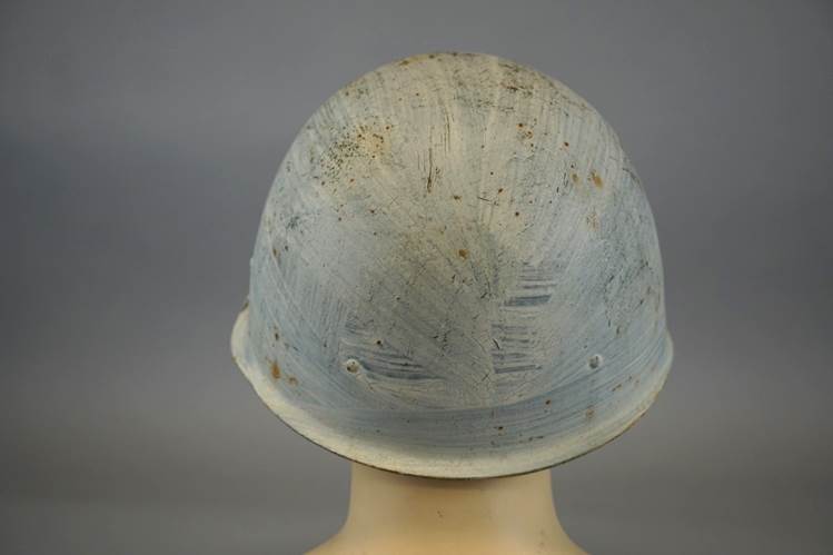 A helmet on a mannequin head

AI-generated content may be incorrect.