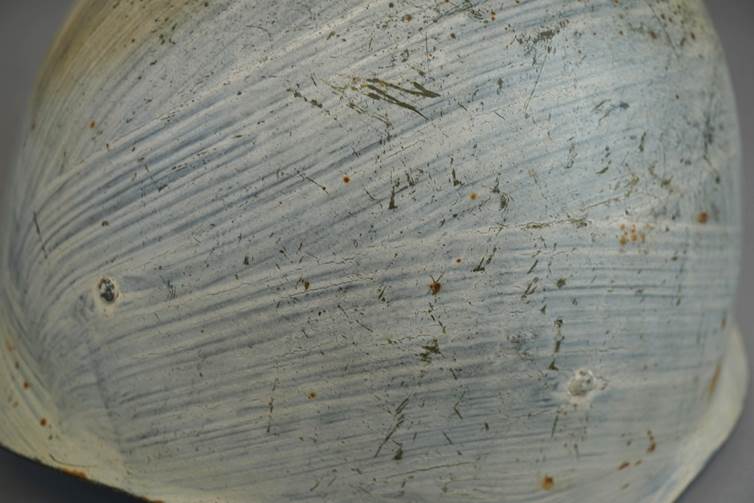 A close-up of a metal surface

AI-generated content may be incorrect.