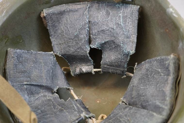 A close-up of a helmet

AI-generated content may be incorrect.